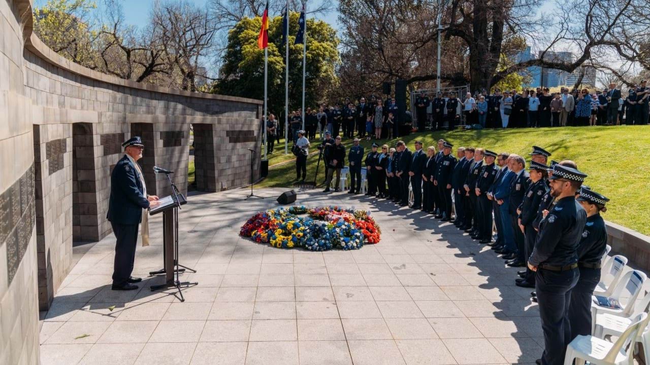 Deputy Commissioner Bob Hill addressing officers and members of the public at the Victoria Police Memorial.